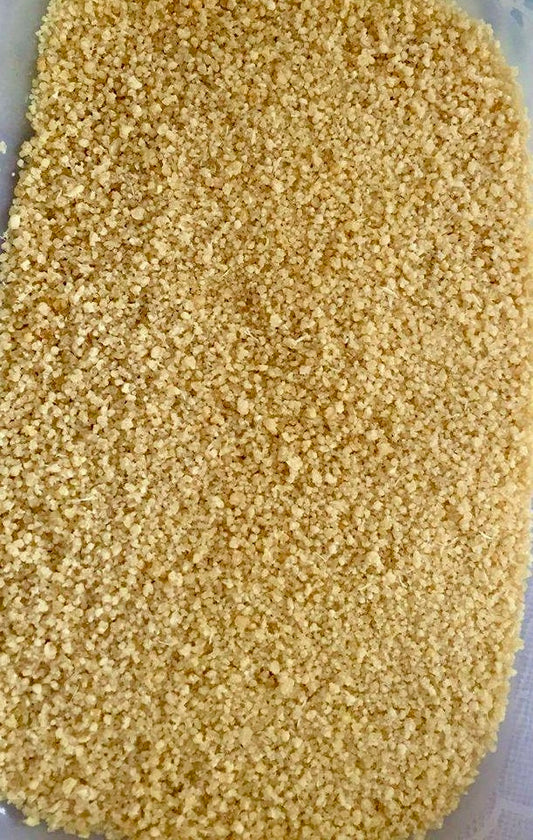 Close-up of Cassava by Yummi Official Attiéké, a granular West African fermented cassava dish